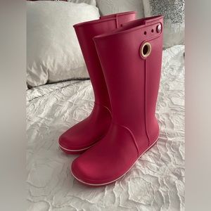 Croc rain boots.